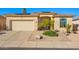 Charming single-story home featuring a desert landscape, solar panels, and a neutral-toned facade at 6442 W Cavedale Dr, Phoenix, AZ 85083