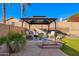 Cozy gazebo with comfortable seating and a beautiful outdoor setting at 6442 W Cavedale Dr, Phoenix, AZ 85083