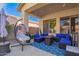 Relaxing outdoor seating area with comfortable furniture and stylish decor at 6442 W Cavedale Dr, Phoenix, AZ 85083