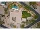 Aerial view of the property featuring a custom pool, putting green, outdoor kitchen, and firepit at 6626 E Oberlin Way, Scottsdale, AZ 85266