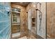 A shower in the bathroom that features marble walls and two shower heads at 6626 E Oberlin Way, Scottsdale, AZ 85266