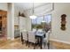 Elegant dining area with backyard views and custom cabinetry at 6626 E Oberlin Way, Scottsdale, AZ 85266