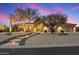 Inviting single-Gathering home with desert landscaping, pathway lighting, and a welcoming front facade at 6626 E Oberlin Way, Scottsdale, AZ 85266