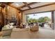 Inviting living room with fireplace and seamless indoor/outdoor living at 6626 E Oberlin Way, Scottsdale, AZ 85266