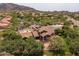 Aerial view of a beautiful community center with a pool and lush desert landscaping at 7149 E Quartz St, Mesa, AZ 85207