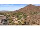 Picturesque golf course with sand traps and lush greens against a mountain backdrop at 7149 E Quartz St, Mesa, AZ 85207