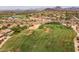 Scenic aerial view of a golf course highlighting its verdant green and sand bunkers at 7149 E Quartz St, Mesa, AZ 85207