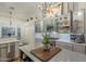 Well-lit kitchen featuring stainless steel appliances, light gray cabinets, and an island at 7149 E Quartz St, Mesa, AZ 85207