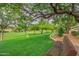 Park view with bench seating and lush landscaping at 7149 E Quartz St, Mesa, AZ 85207