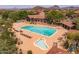 Aerial view of community pool with a pool, lap pool and desert landscaping at 7149 E Quartz St, Mesa, AZ 85207