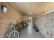 Convenient bike storage area with multiple bicycles parked neatly and brick walls, providing an organized space at 7401 E Northland Dr # 1, Scottsdale, AZ 85251