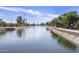 Scenic waterway with lush green landscape, providing a calming and picturesque natural environment at 7401 E Northland Dr # 1, Scottsdale, AZ 85251