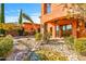 A peaceful stream flows alongside this home's outdoor patio at 7500 E Roy Rogers Rd, Scottsdale, AZ 85266