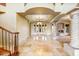 A grand foyer features marble flooring, a fireplace, and large windows at 7500 E Roy Rogers Rd, Scottsdale, AZ 85266