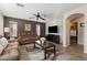 Comfortable living room with tile floors, a ceiling fan, and great natural light at 77 W Diamond Trl, San Tan Valley, AZ 85143