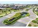 Aerial view of the Haven community entrance featuring elegant landscaping, water feature and beautiful new homes at 781 W Flintlock Way, Chandler, AZ 85286