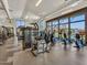 The spacious gym offers a variety of exercise machines, perfect for a full body workout with great window views at 781 W Flintlock Way, Chandler, AZ 85286