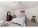 A bright main bedroom with carpeted floor, ceiling fan and traditional furniture at 8500 E Southern Ave # 488, Mesa, AZ 85209