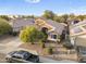 Aerial view of the exterior of a single-story home, showcasing the landscaping and neighborhood at 8630 W Apache St, Tolleson, AZ 85353