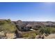 Community aerial view showcasing the property's location and beautiful desert surroundings at 8634 E Kael Cir, Mesa, AZ 85207