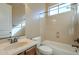 Clean bathroom showcasing vanity, toilet, tub and shower at 8634 E Kael Cir, Mesa, AZ 85207