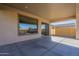 The large windows allow natural light to the patio area from within the home at 8634 E Kael Cir, Mesa, AZ 85207