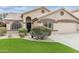 Charming single-story home with manicured lawn and inviting curb appeal at 9001 W Lone Cactus Dr, Peoria, AZ 85382