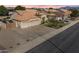 Desirable single-story home featuring a three-car garage, desert landscaping, and a peaceful neighborhood at 9544 E Irwin Ave, Mesa, AZ 85209