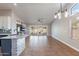 Bright living room with a fan, a large sliding glass door, an entertainment center and tile flooring at 9544 E Irwin Ave, Mesa, AZ 85209