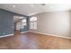 Open-concept living room with tile flooring and modern archways at 9544 E Irwin Ave, Mesa, AZ 85209