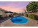 Sparkling pool and patio area offers a refreshing outdoor escape for relaxation and entertainment at 9544 E Irwin Ave, Mesa, AZ 85209