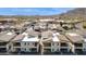 Aerial view of luxurious multi-story homes with tile roofs in a desert community at 1 Easy St # 15, Carefree, AZ 85377