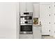 Modern kitchen appliances featuring built-in oven and microwave with gray cabinetry at 1 Easy St # 15, Carefree, AZ 85377