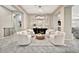 Serene living room featuring four comfortable chairs and decorative accents at 9388 W Cashman Dr, Peoria, AZ 85383