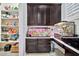 Spacious pantry with ample shelving and storage, plus additional built-in cabinets and counterspace at 9388 W Cashman Dr, Peoria, AZ 85383