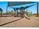 Community playground with slides and climbing structures provides outdoor fun for families and children at 9388 W Cashman Dr, Peoria, AZ 85383
