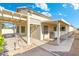 Backyard showcasing covered patios and walkways; perfect for entertaining and enjoying outdoor living at 10622 W Mohawk Ln, Peoria, AZ 85382