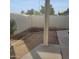 Large backyard, featuring desert landscaping and privacy fence at 10622 W Mohawk Ln, Peoria, AZ 85382