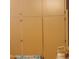 Messy basement with storage cabinets, tools, and storage at 10622 W Mohawk Ln, Peoria, AZ 85382