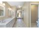 Beautifully designed bathroom features dual sinks, ample counter space, and convenient layout at 10622 W Mohawk Ln, Peoria, AZ 85382