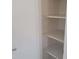 Open closet featuring multiple shelves, perfect for linen or pantry storage at 10622 W Mohawk Ln, Peoria, AZ 85382