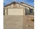 Charming single-story home with a two-car garage, desert landscaping, and decorative accents at 10622 W Mohawk Ln, Peoria, AZ 85382