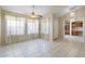 Bright and airy living room with tile flooring and natural light at 10622 W Mohawk Ln, Peoria, AZ 85382