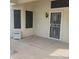 View of the back patio of the home with a locked security door at 10622 W Mohawk Ln, Peoria, AZ 85382