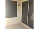 Cozy outdoor patio featuring a window, a sliding door, and a stucco wall at 10622 W Mohawk Ln, Peoria, AZ 85382