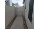 View of the side yard featuring a gate access at 10622 W Mohawk Ln, Peoria, AZ 85382