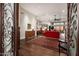 Home Foyer with hardwood floors, decorative rug, and view of living room at 11067 E Juan Tabo Rd, Scottsdale, AZ 85255