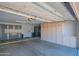 Spacious garage featuring ample storage cabinets and a convenient utility sink at 13913 W Whitewood Dr, Sun City West, AZ 85375
