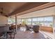 Screened in patio area with tiled floor and beautiful views at 13913 W Whitewood Dr, Sun City West, AZ 85375