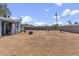 Spacious backyard featuring gravel, fenced perimeter, and metal structures, perfect for outdoor activities and easy maintenance at 14820 N 35Th St, Phoenix, AZ 85032